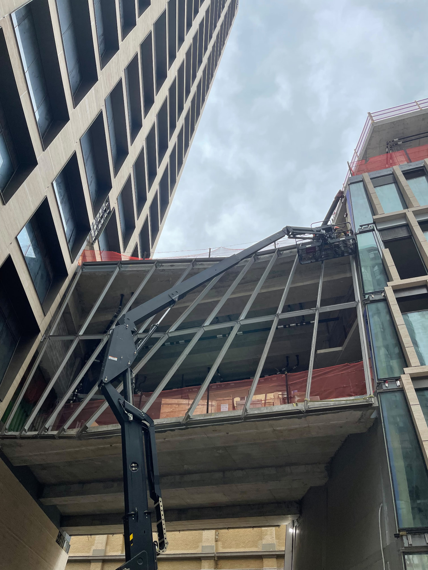 Glass bridge framing installation at 500 West 18th Street