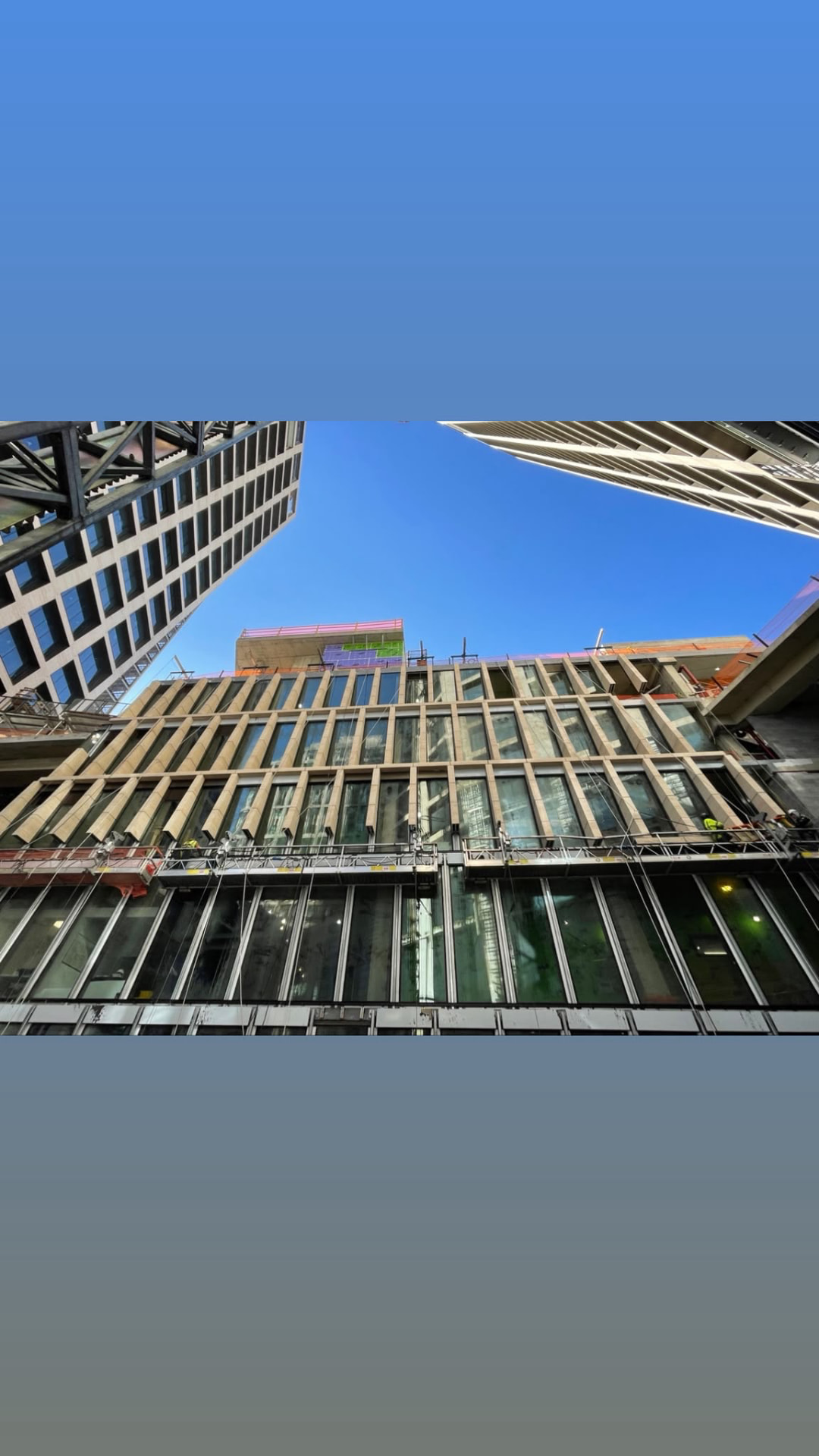 Facade and glazing installation viewed from the courtyard at 500 West 18th Street