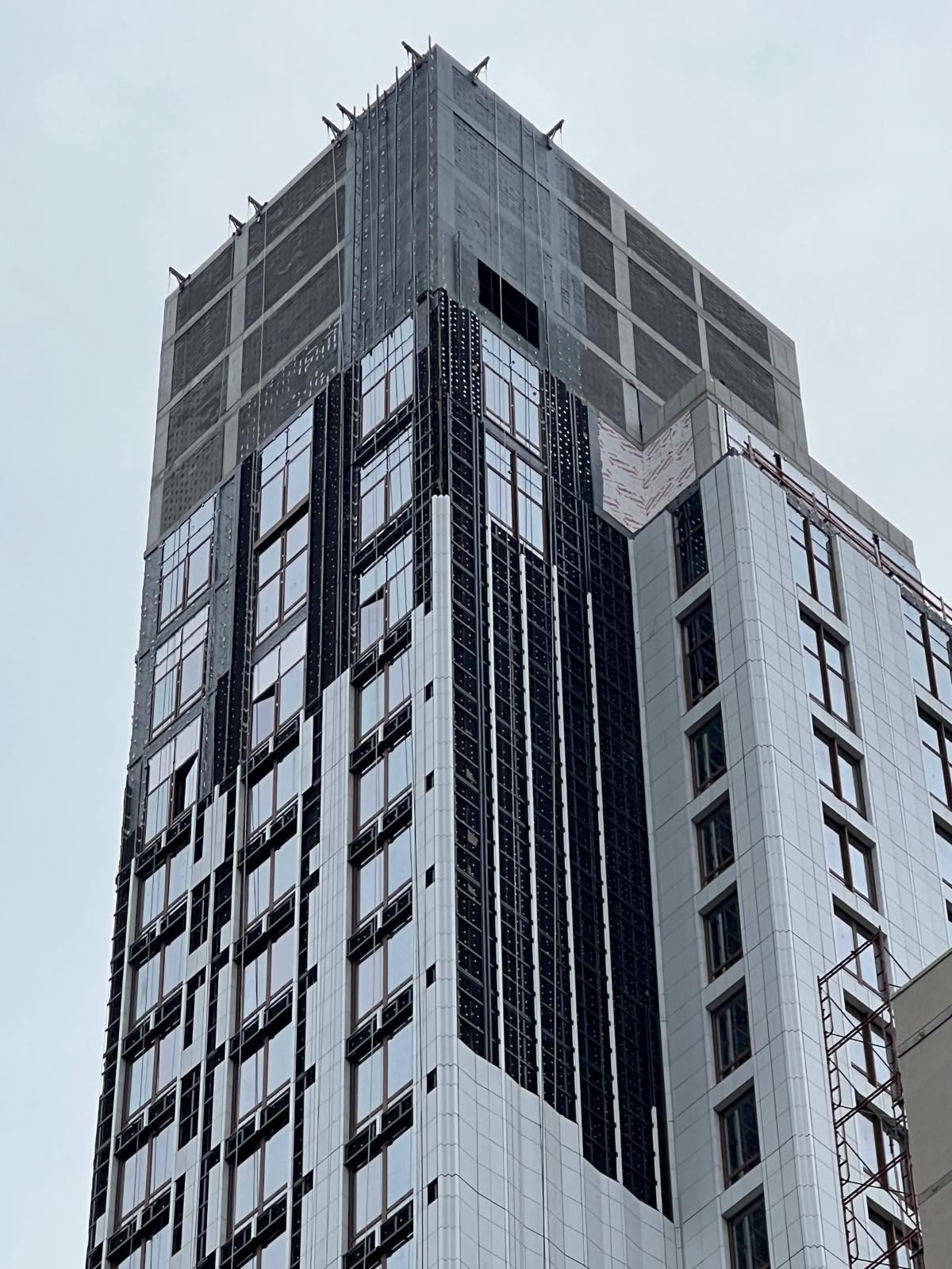 Upper floors of 1299 3rd Avenue during facade installation