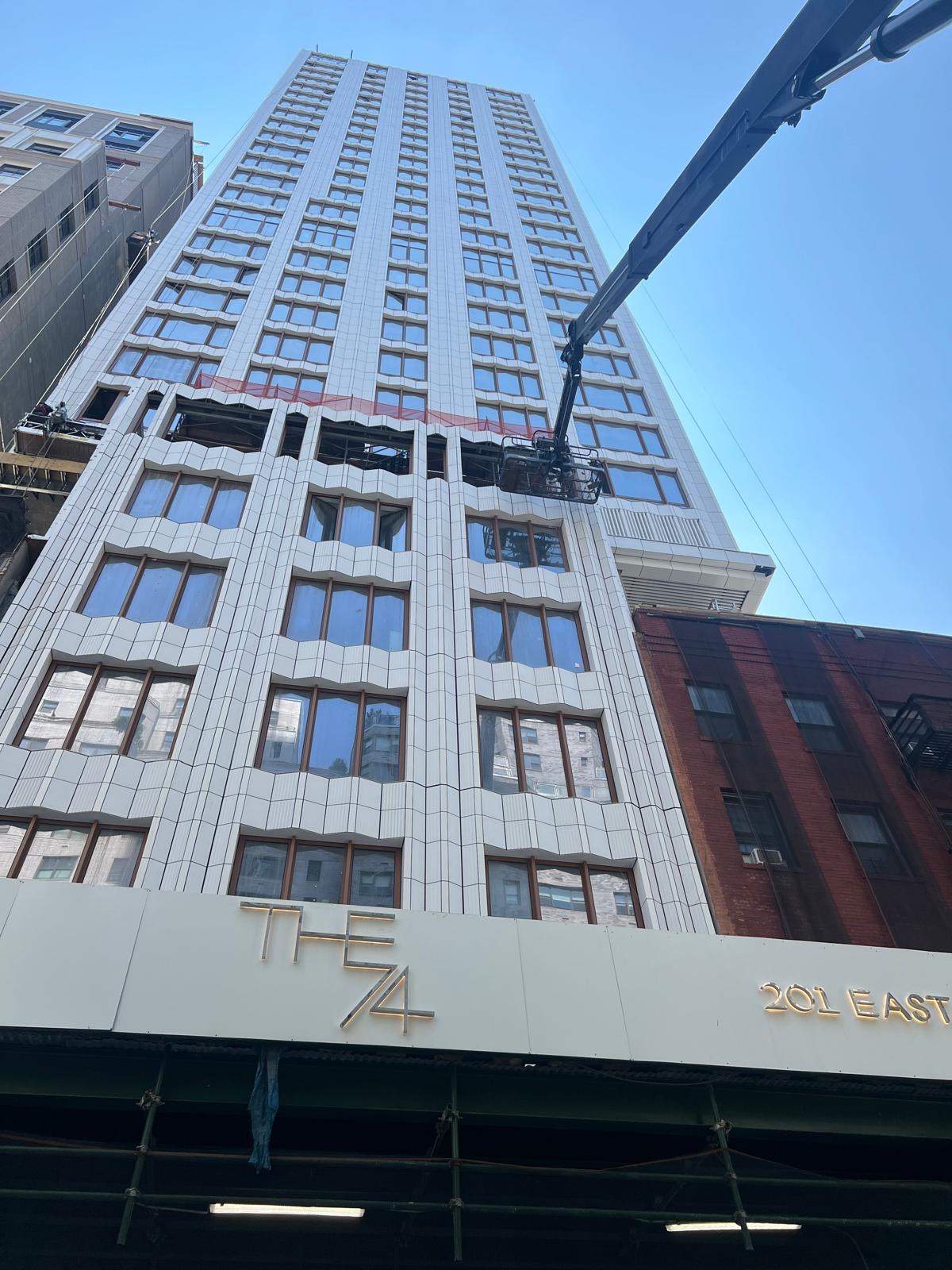 1299 3rd Avenue commercial tower viewed from street level
